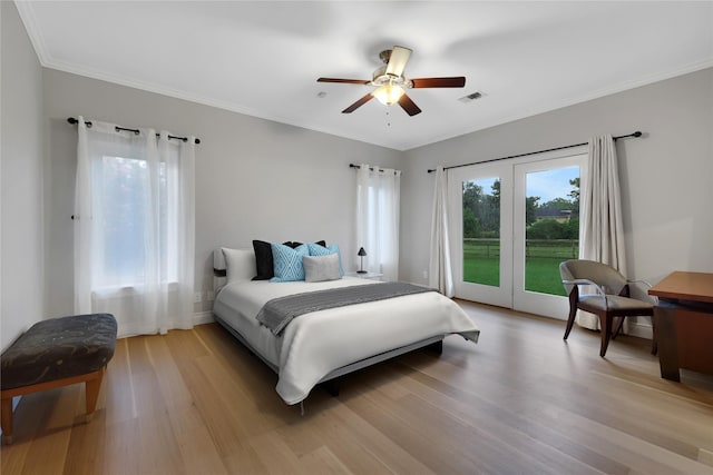 bedroom with access to exterior, ceiling fan, and light wood-type flooring