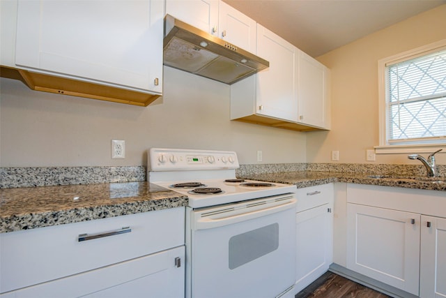 kitchen with stone counters, white cabinetry, sink, white electric range oven, and dark wood-type flooring