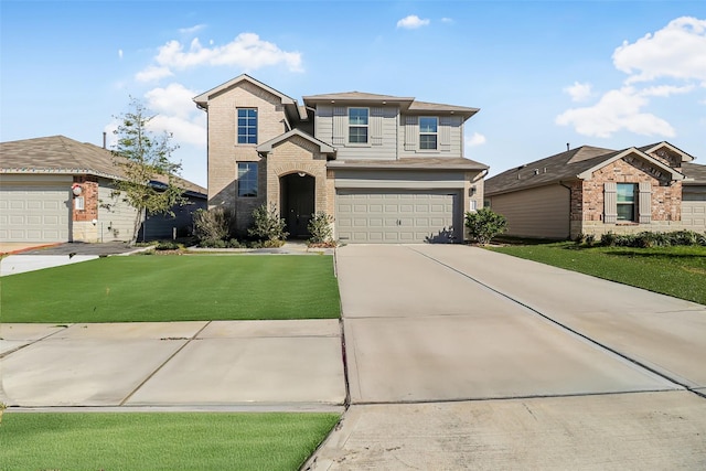 view of front of property featuring a garage and a front lawn