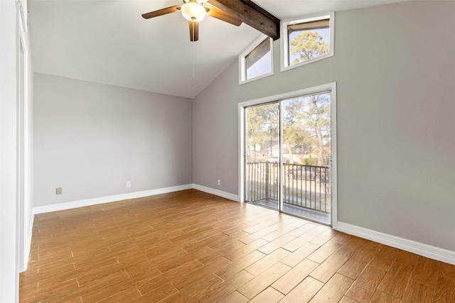 spare room with beam ceiling, ceiling fan, and high vaulted ceiling