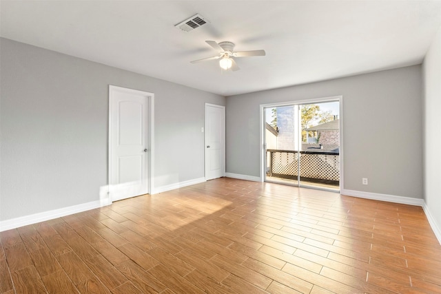 unfurnished room with ceiling fan