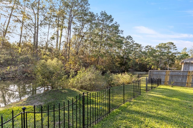 view of yard with a water view