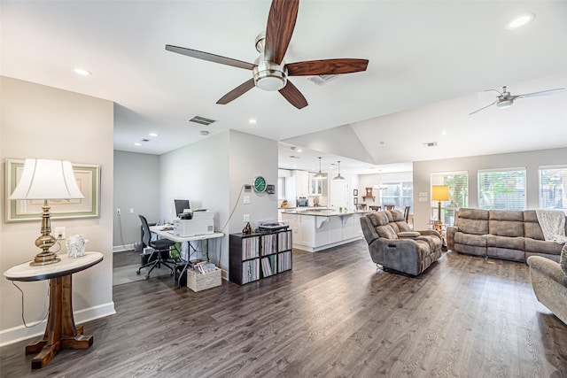 living room featuring ceiling fan, dark hardwood / wood-style flooring, and lofted ceiling