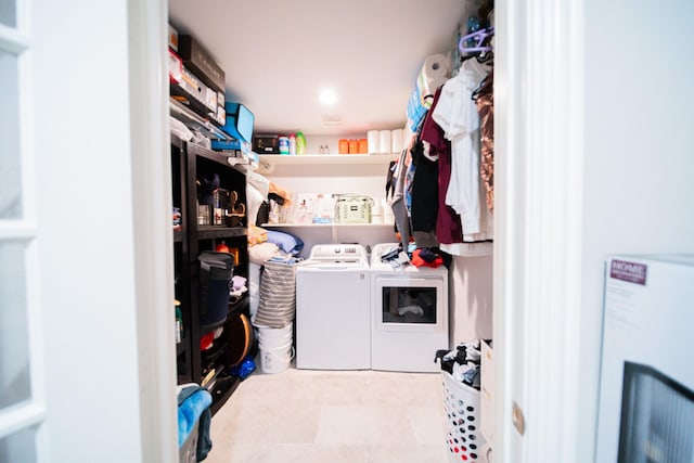 washroom featuring independent washer and dryer