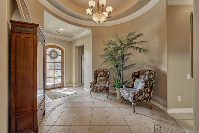 living area featuring light tile patterned floors, a raised ceiling, crown molding, and a notable chandelier