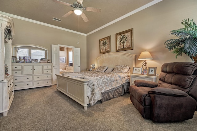 carpeted bedroom featuring a textured ceiling, ensuite bath, ceiling fan, and ornamental molding