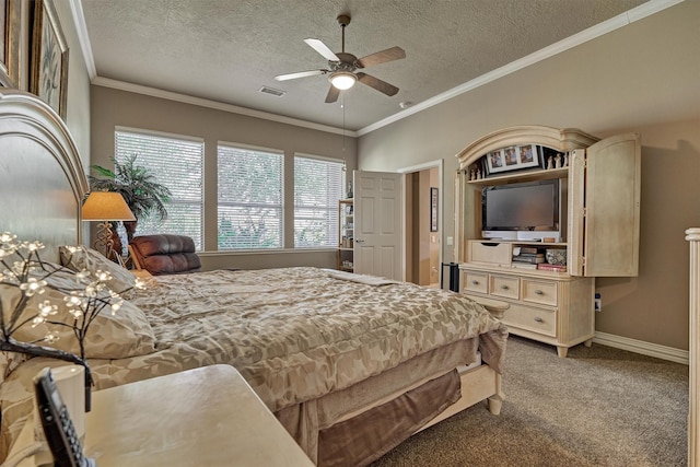 bedroom with carpet, a textured ceiling, ceiling fan, and crown molding