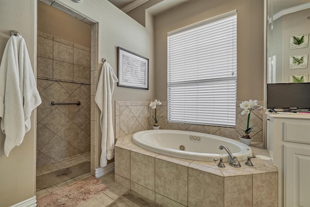 bathroom featuring tile patterned flooring, separate shower and tub, and ornamental molding