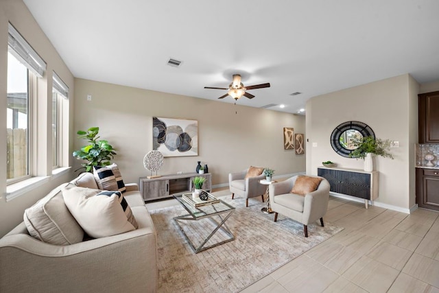 living room featuring ceiling fan