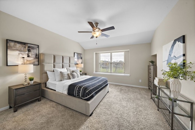 bedroom featuring vaulted ceiling, ceiling fan, and carpet