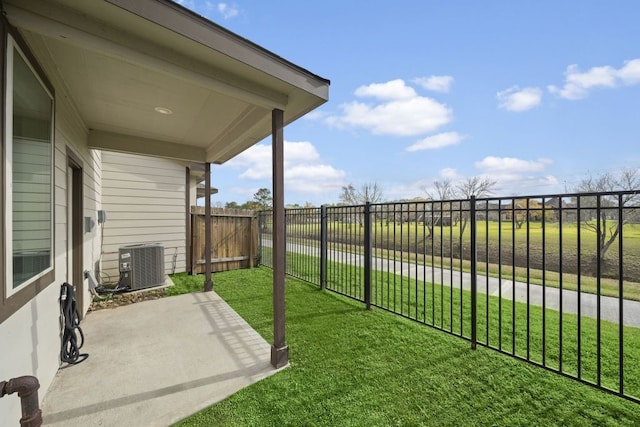 view of yard featuring a patio and cooling unit