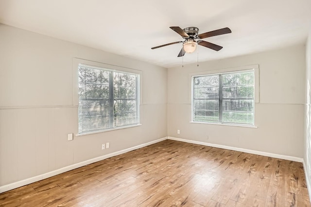 unfurnished room with ceiling fan and light hardwood / wood-style floors