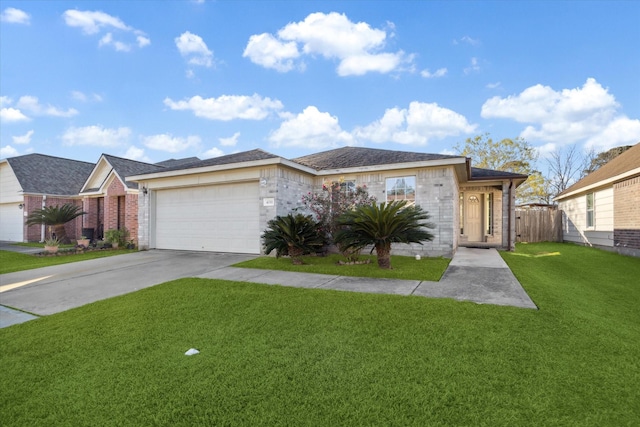 single story home with a garage and a front yard