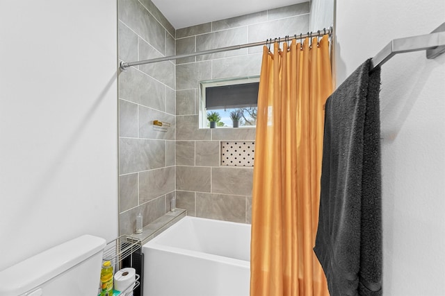 bathroom with toilet and shower / bathtub combination with curtain