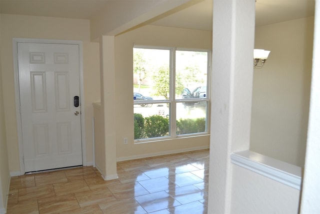 entrance foyer featuring light tile patterned flooring