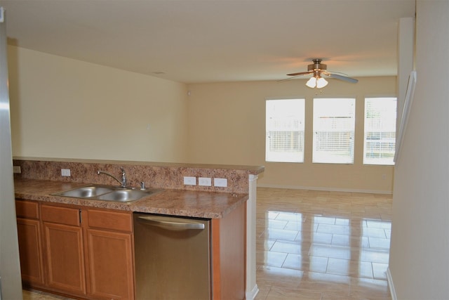 kitchen with dishwasher, light tile patterned floors, ceiling fan, and sink