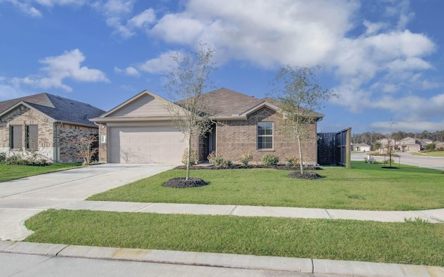 ranch-style home featuring a garage and a front yard