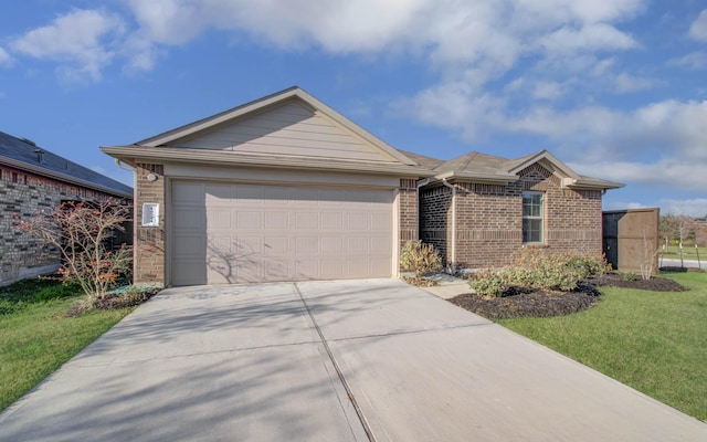 ranch-style home featuring a garage and a front lawn