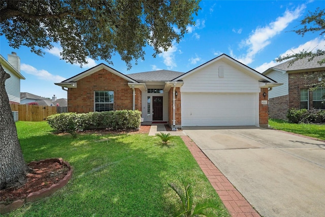 ranch-style home featuring a front yard and a garage