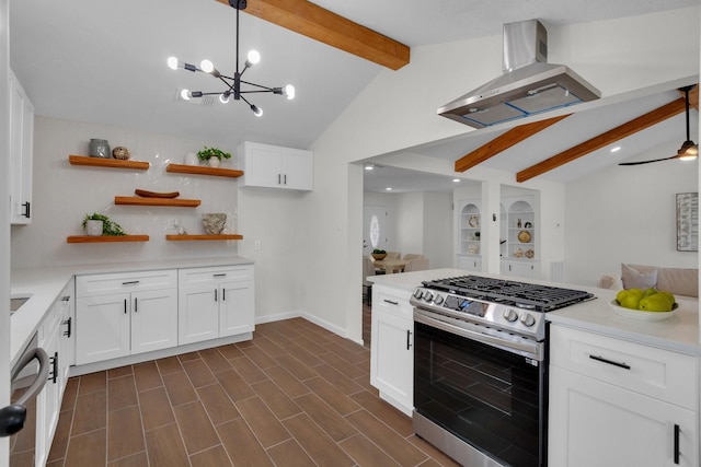 kitchen featuring white cabinets, lofted ceiling with beams, range hood, decorative light fixtures, and stainless steel appliances