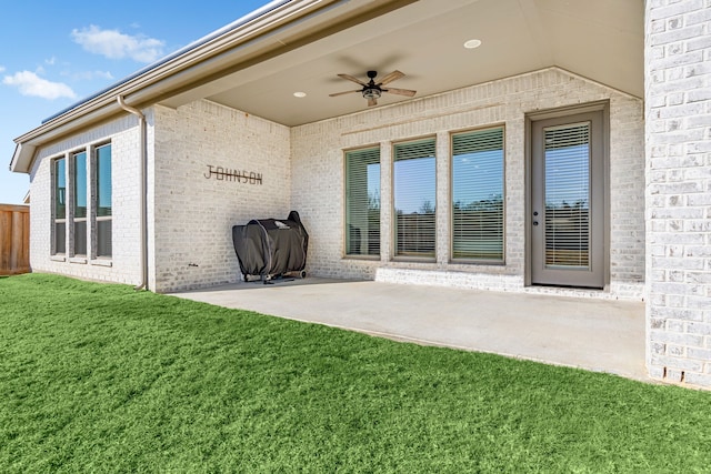 view of patio featuring grilling area and ceiling fan