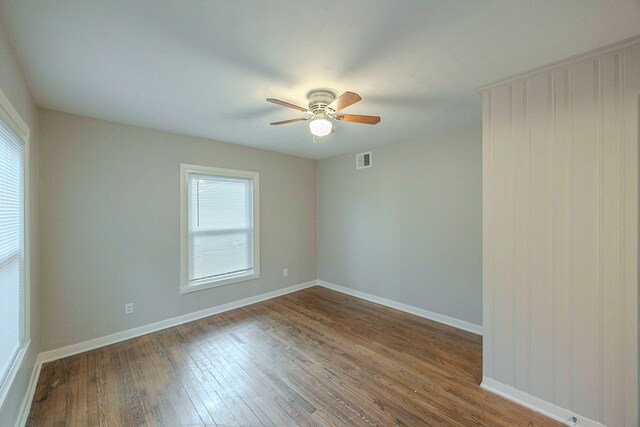 1202 14th Ave N, Texas City, TX 77590 - spare room with dark hardwood / wood-style floors and ceiling fan