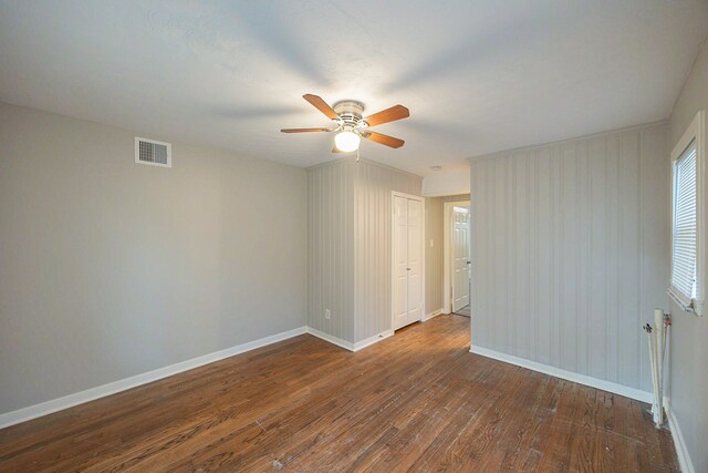 1202 14th Ave N, Texas City, TX 77590 - spare room with dark hardwood / wood-style floors and ceiling fan