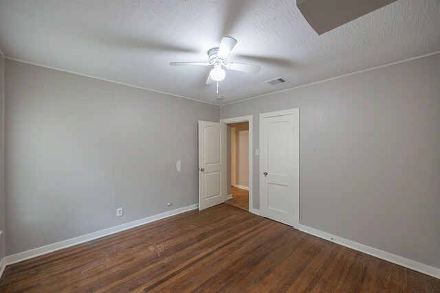 1202 14th Ave N, Texas City, TX 77590 - unfurnished room featuring ceiling fan, crown molding, dark wood-type flooring, and a textured ceiling