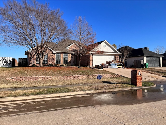 single story home featuring a garage