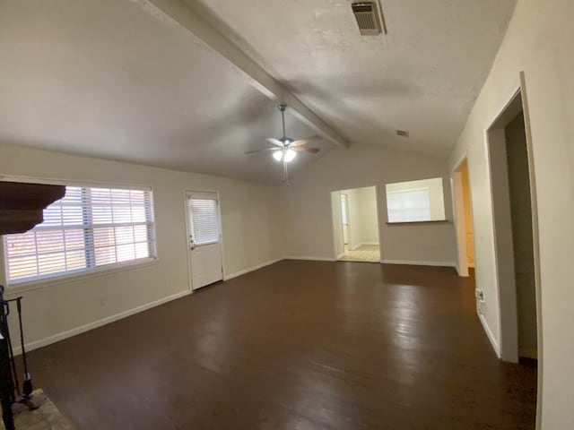 empty room with vaulted ceiling with beams, dark hardwood / wood-style floors, and ceiling fan