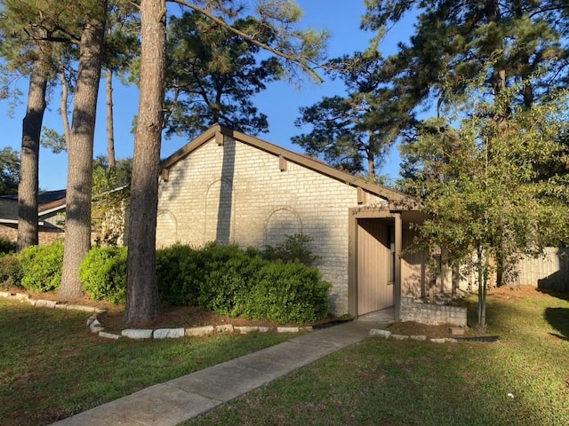 view of property exterior featuring a yard