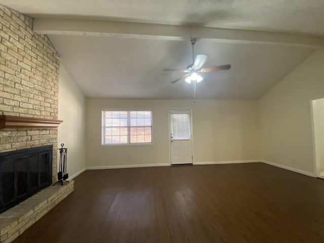 unfurnished living room with a fireplace, vaulted ceiling with beams, ceiling fan, and dark wood-type flooring