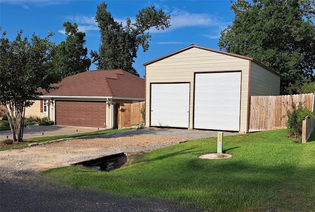 garage featuring a yard