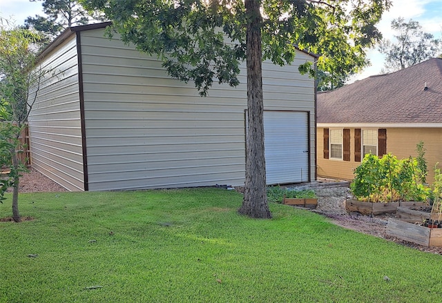 view of side of home featuring a yard