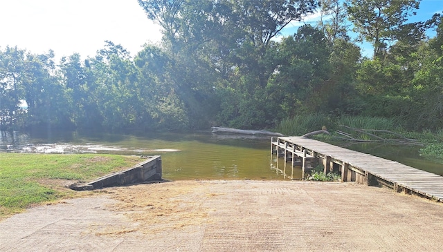 view of dock with a water view