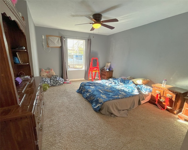 bedroom featuring carpet flooring and ceiling fan