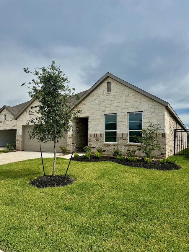 3020 Ruby Ridge Dr, Katy, TX 77493 - view of front of house with a garage, concrete driveway, a front lawn, and brick siding