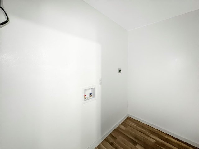 washroom featuring hookup for an electric dryer, dark wood-type flooring, and hookup for a washing machine