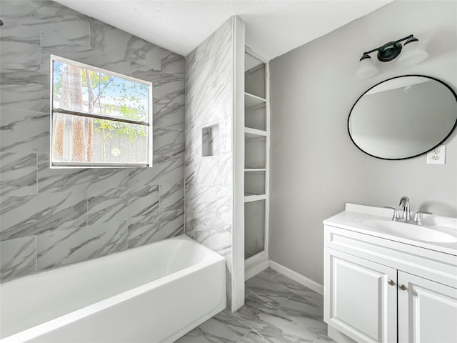 bathroom with shower / bathing tub combination and vanity