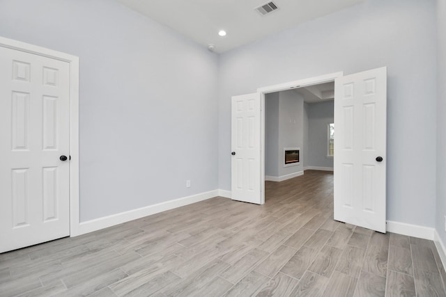 unfurnished bedroom featuring a closet