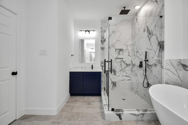 bathroom featuring vanity and separate shower and tub