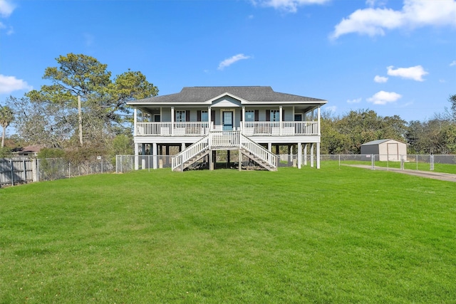 view of front of property with a porch and a front yard