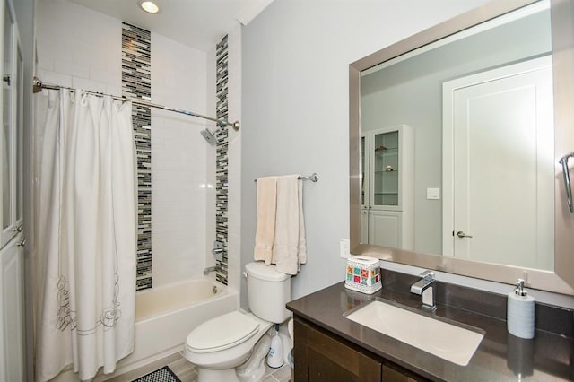 full bathroom featuring vanity, shower / bath combination with curtain, and toilet