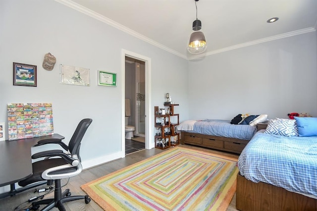 bedroom featuring ensuite bathroom, wood-type flooring, and ornamental molding