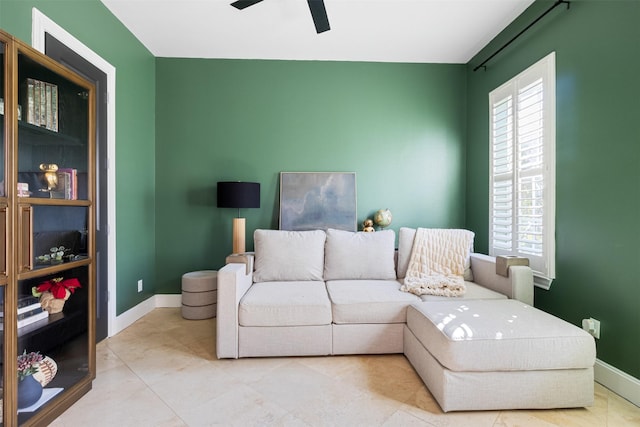 living room featuring ceiling fan