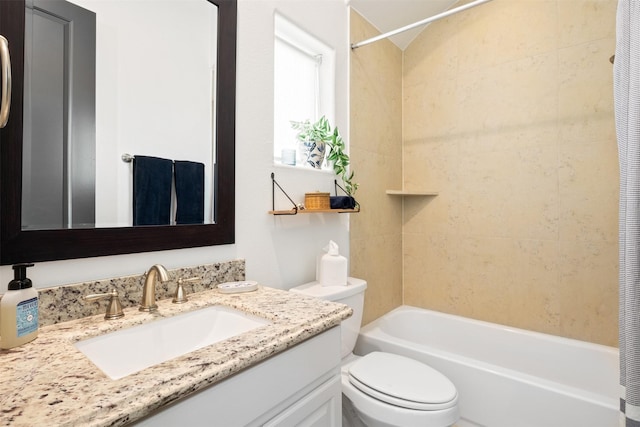 full bathroom featuring shower / tub combo, vanity, and toilet