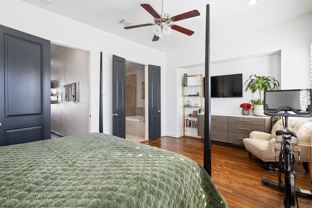 bedroom with connected bathroom, ceiling fan, and dark wood-type flooring