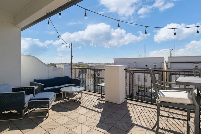 view of patio / terrace featuring outdoor lounge area and a balcony