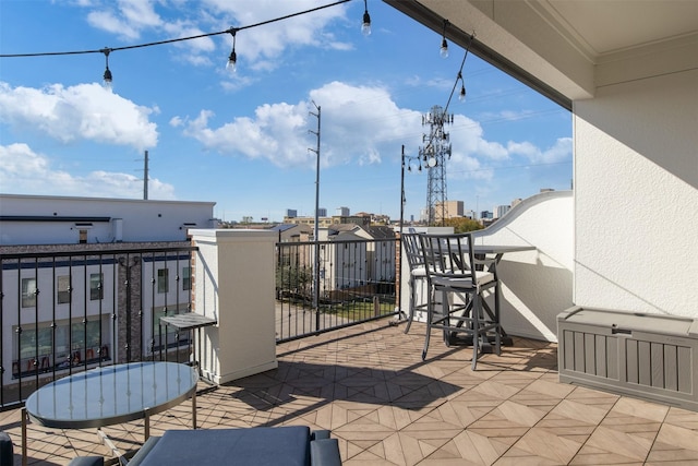 view of patio with a balcony