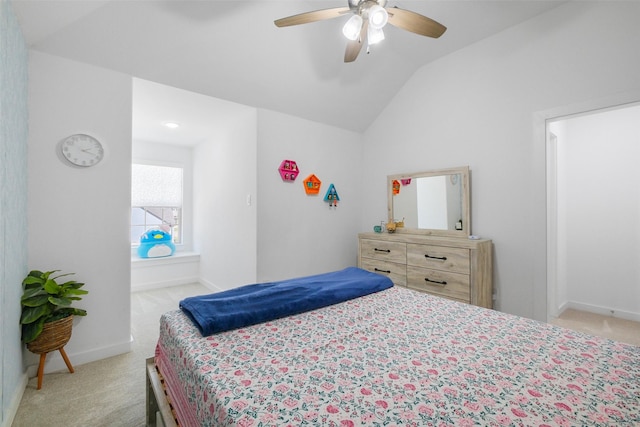 bedroom with ceiling fan, light carpet, and lofted ceiling